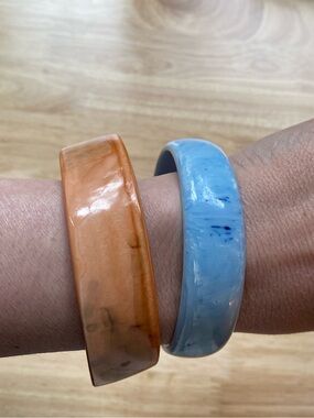 Pair of Resin/Plastic? Bangle Bracelets in Orange and Light Blue
